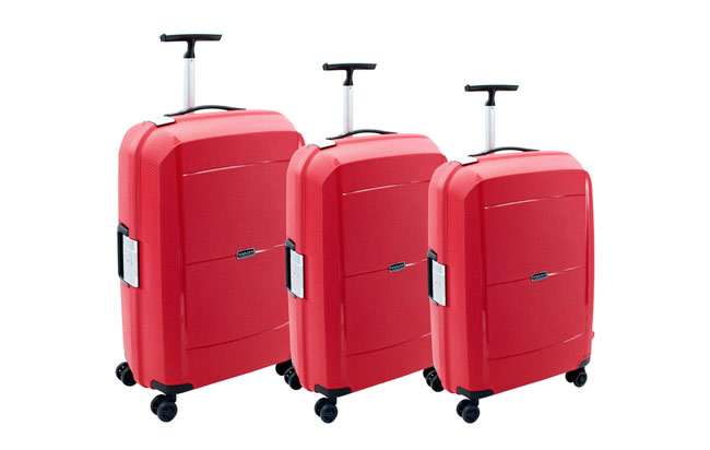 como_hacer_una_maleta-trucos_para_ahorrar_espacio-primeriti-set_maletas_rojas